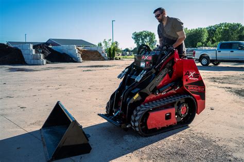 tracked skid steer loadeing river gravels|10 Facts You Need to Know About the Gravely AXIS® .